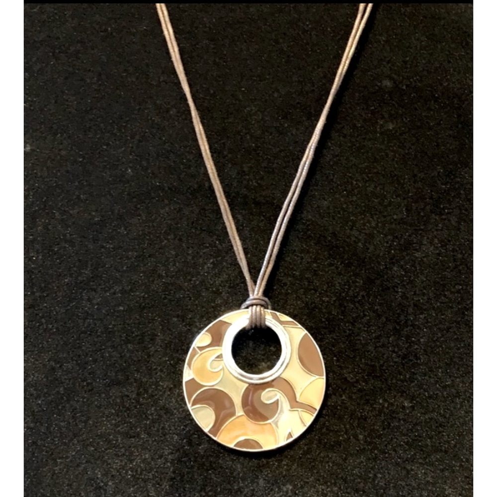 Lia Sophia Amber Waves reversible pendant with double strand cord. Pre loved